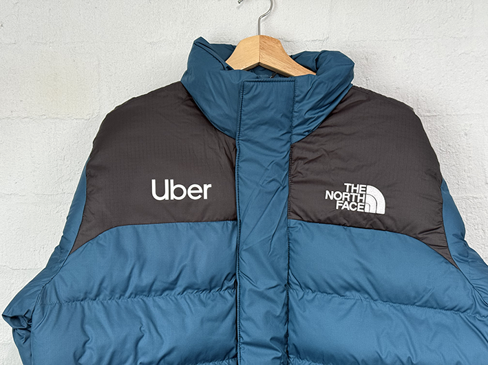 Eigen opdruk op een The North Face bodywarmer, Visualprint transferprint